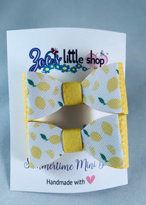 Faux leather 2 inch mini bow with summertime theme